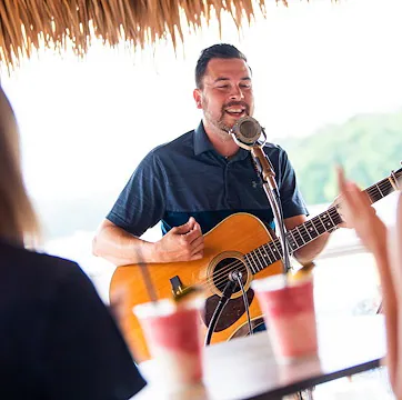 https://margaritaville-resorts.com/wp-content/uploads/2025/07/tiki-hut-pool-bar-2021-23.webp
